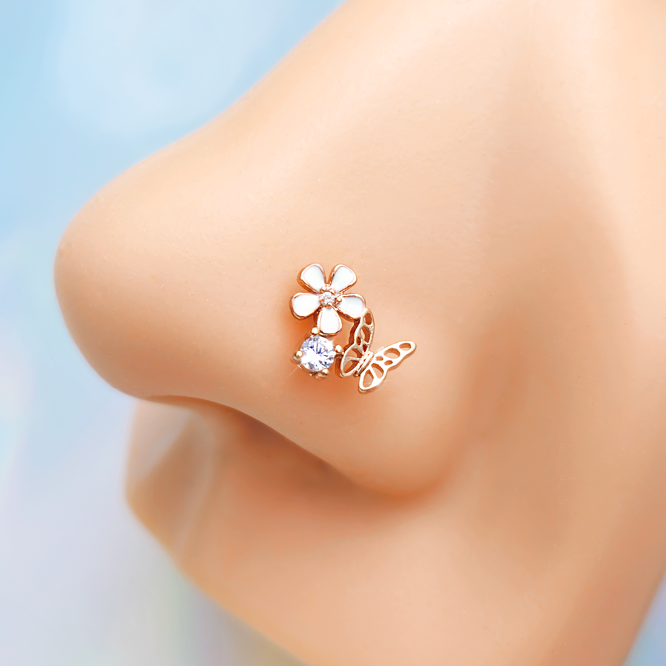20G 1/4 Clear CZ Gem Rose Gold Tone Butterfly Flower Nose Bone