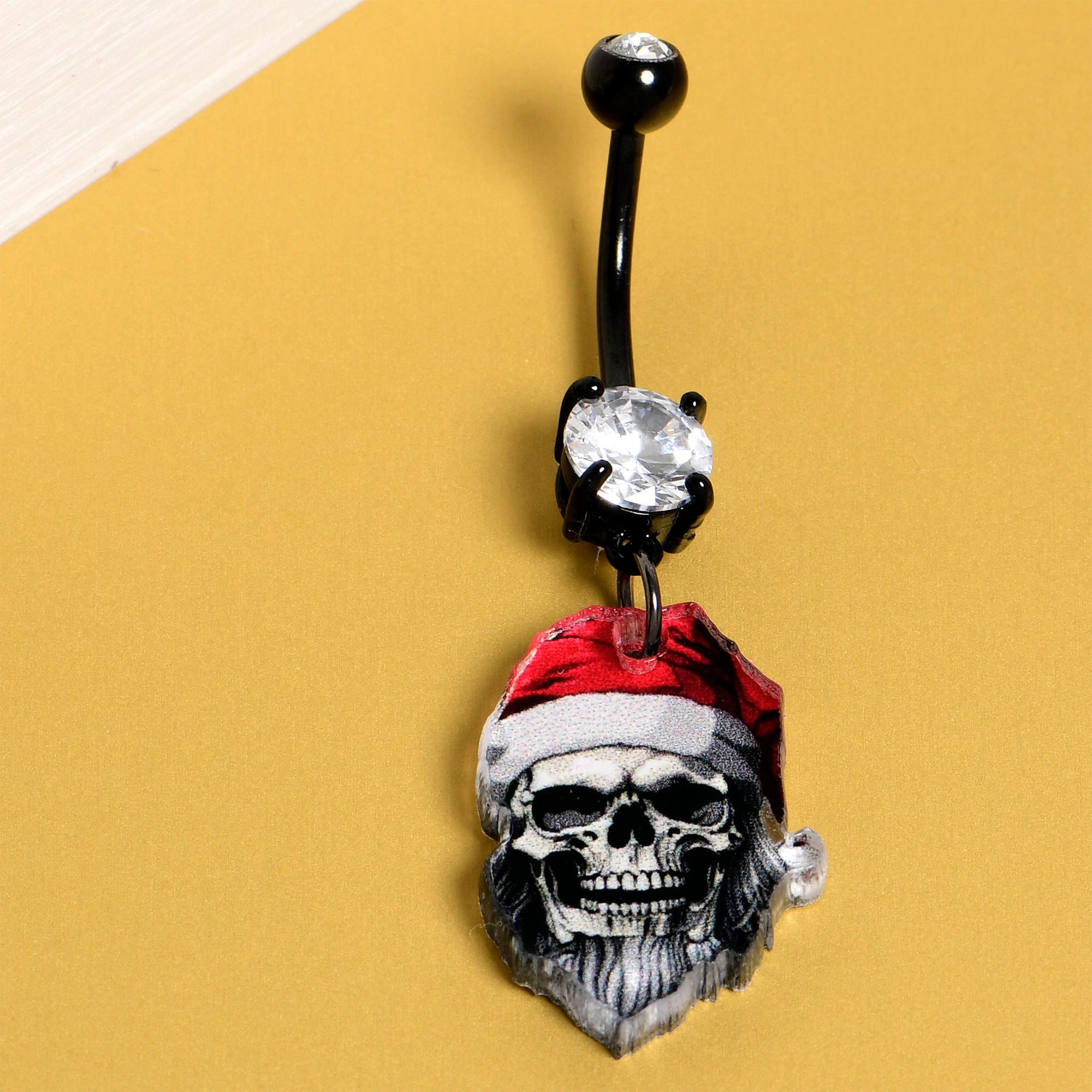 Holiday Santa skeleton dangle navel piercing ring black gem accents
