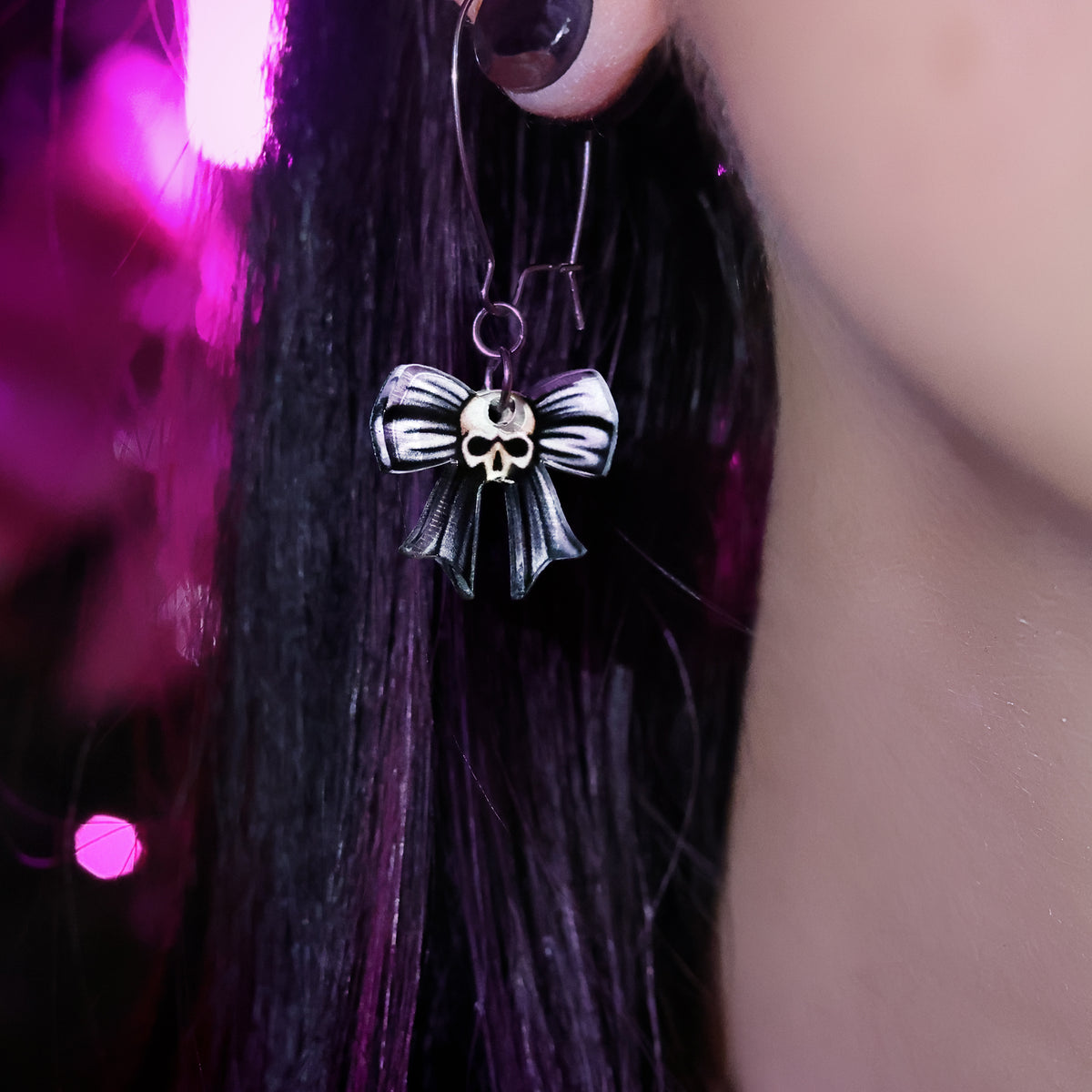 Wicked Bow Skull Acrylic Dangle Earrings by Onyx O