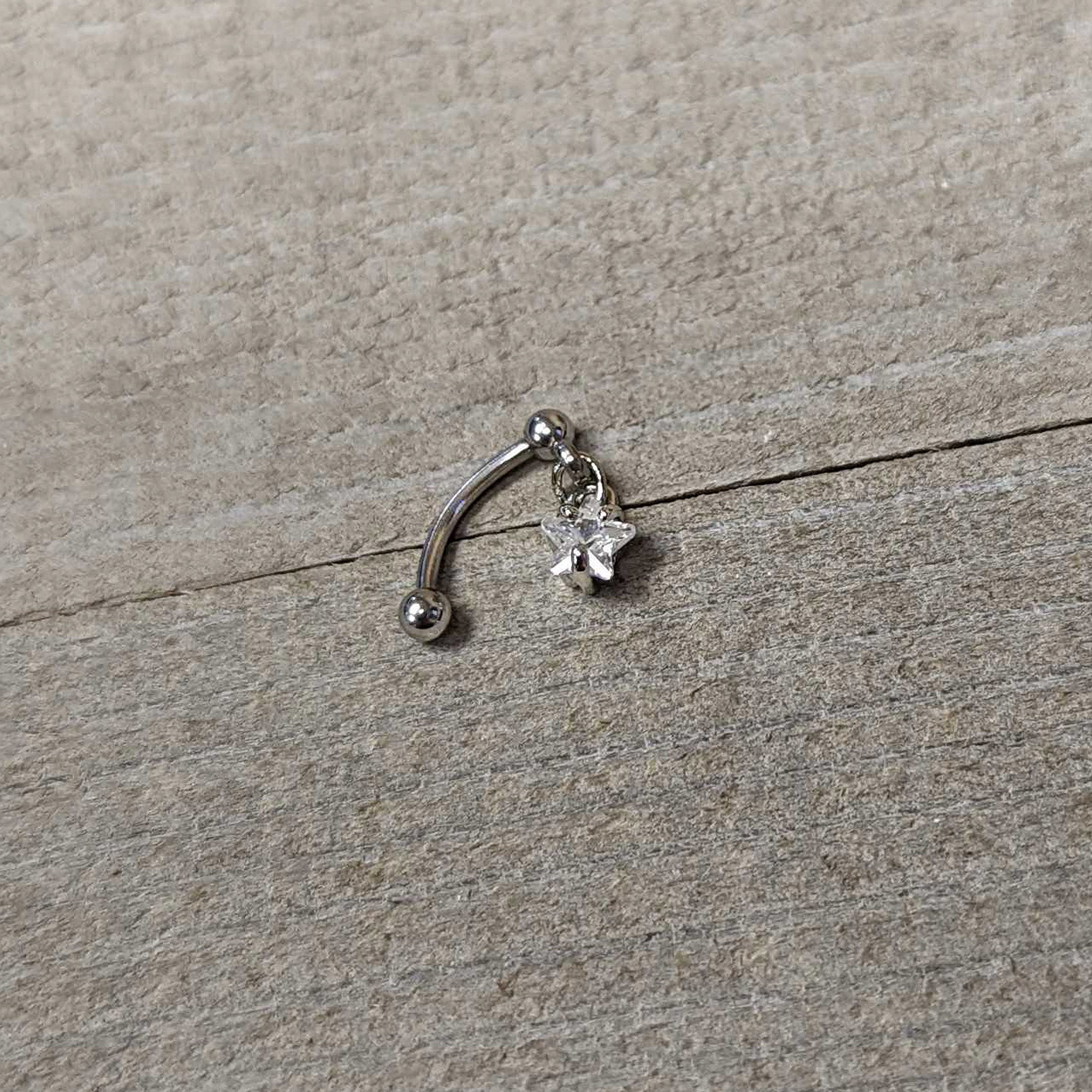Top Down Clear Gem Dangle Star Eyebrow Ring