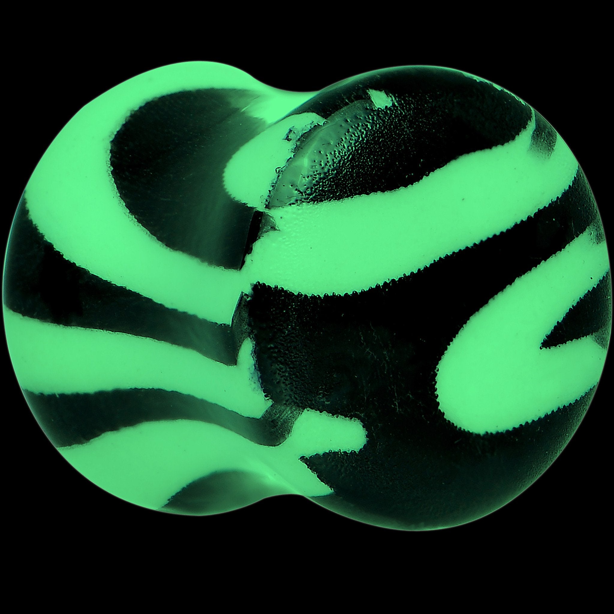 Zebra Print Glow in the Dark Saddle Plug 2G to 1 Inch