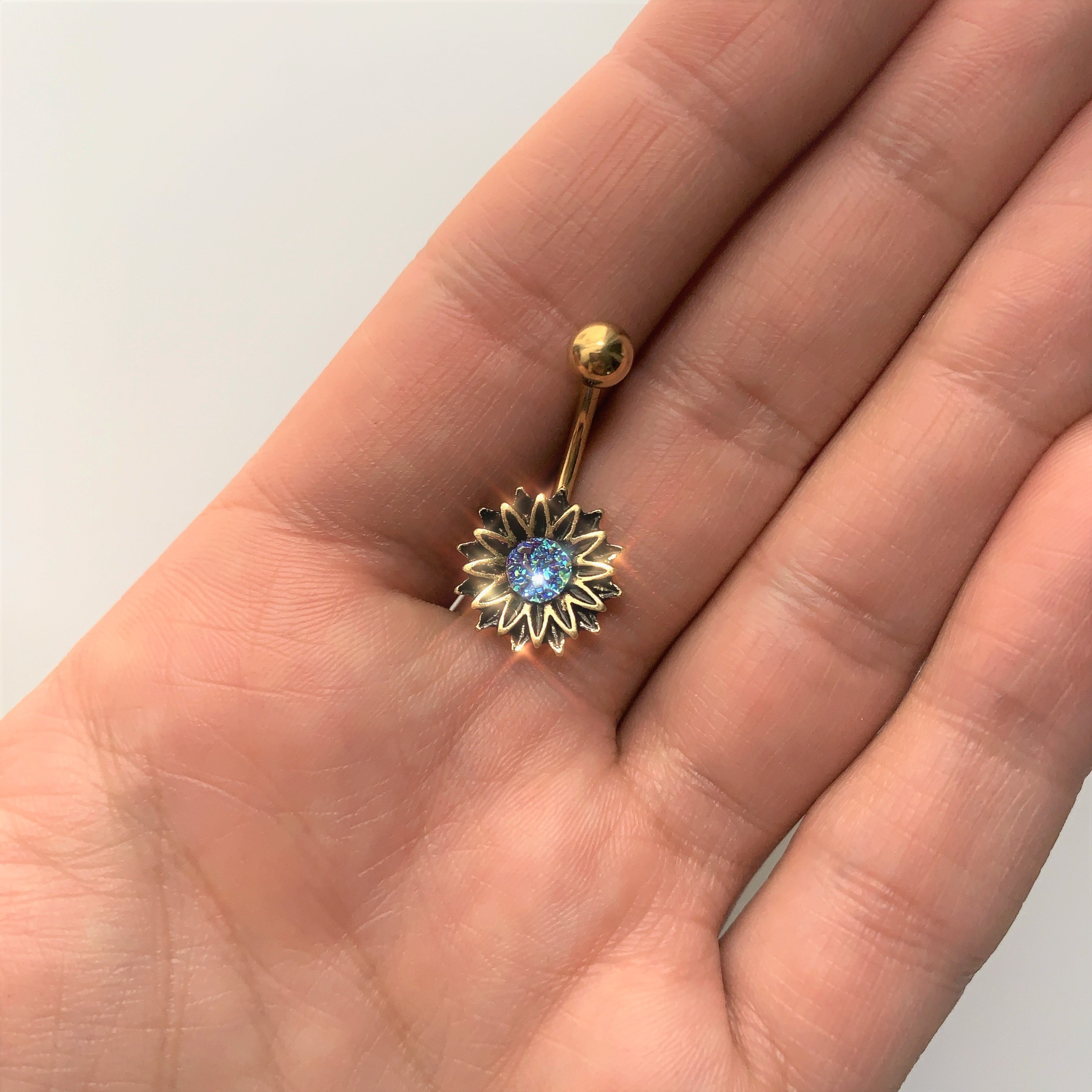 Gold Tone Aqua Center Sunburst Flower Belly Ring