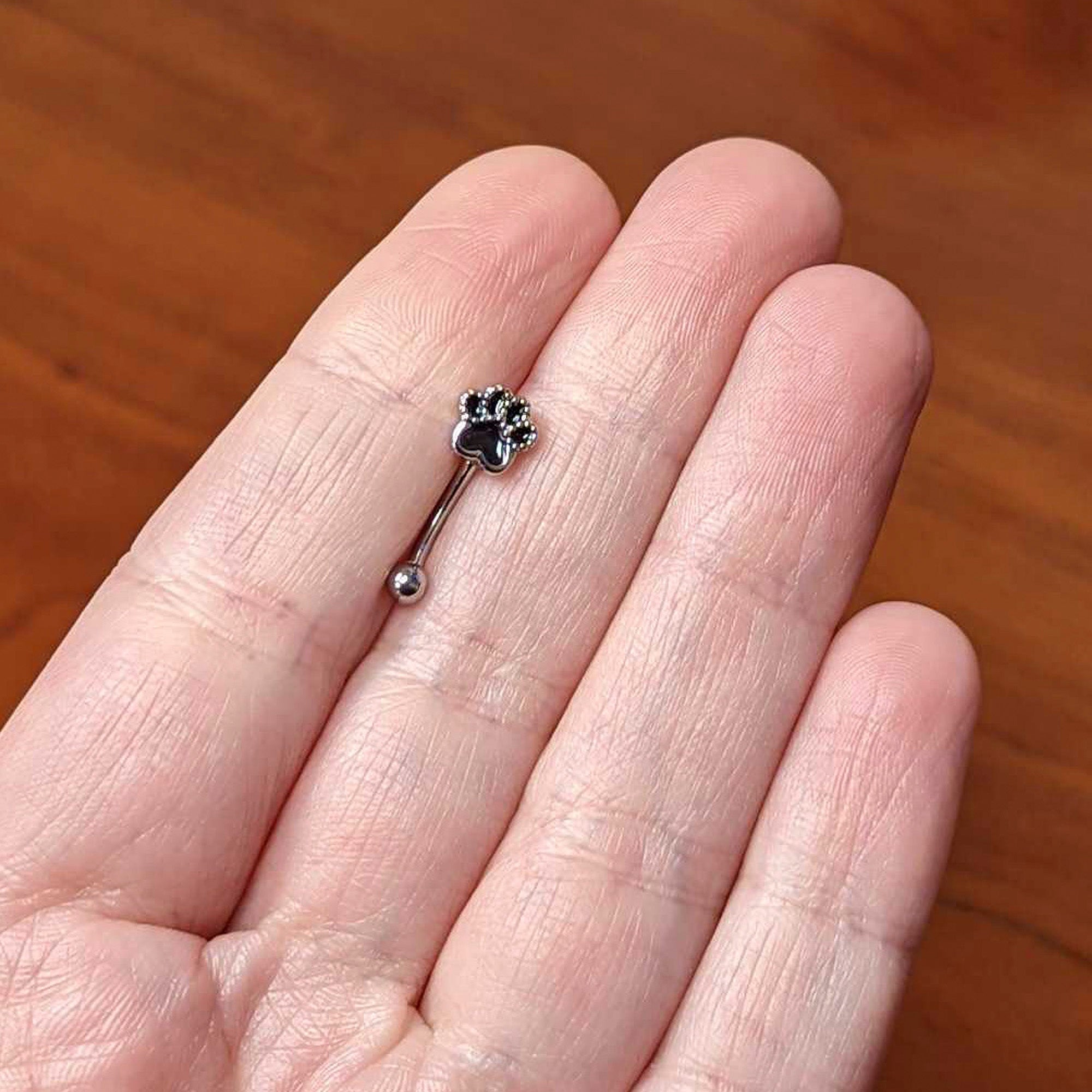 16G 5/16 Textured Black Paw Print Curved Eyebrow Ring