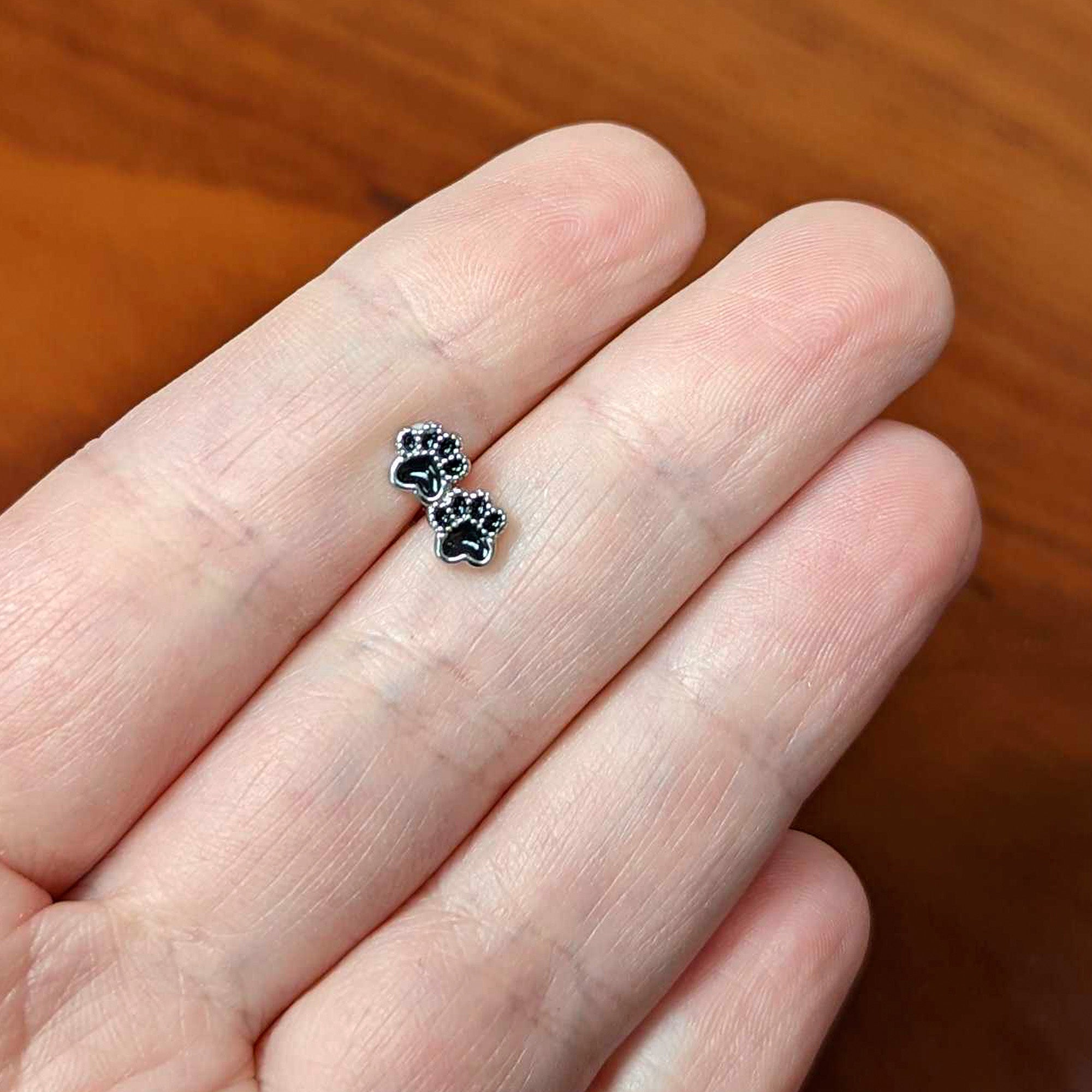 16G 1/4 Textured Black Paw Prints Cartilage Tragus Earring