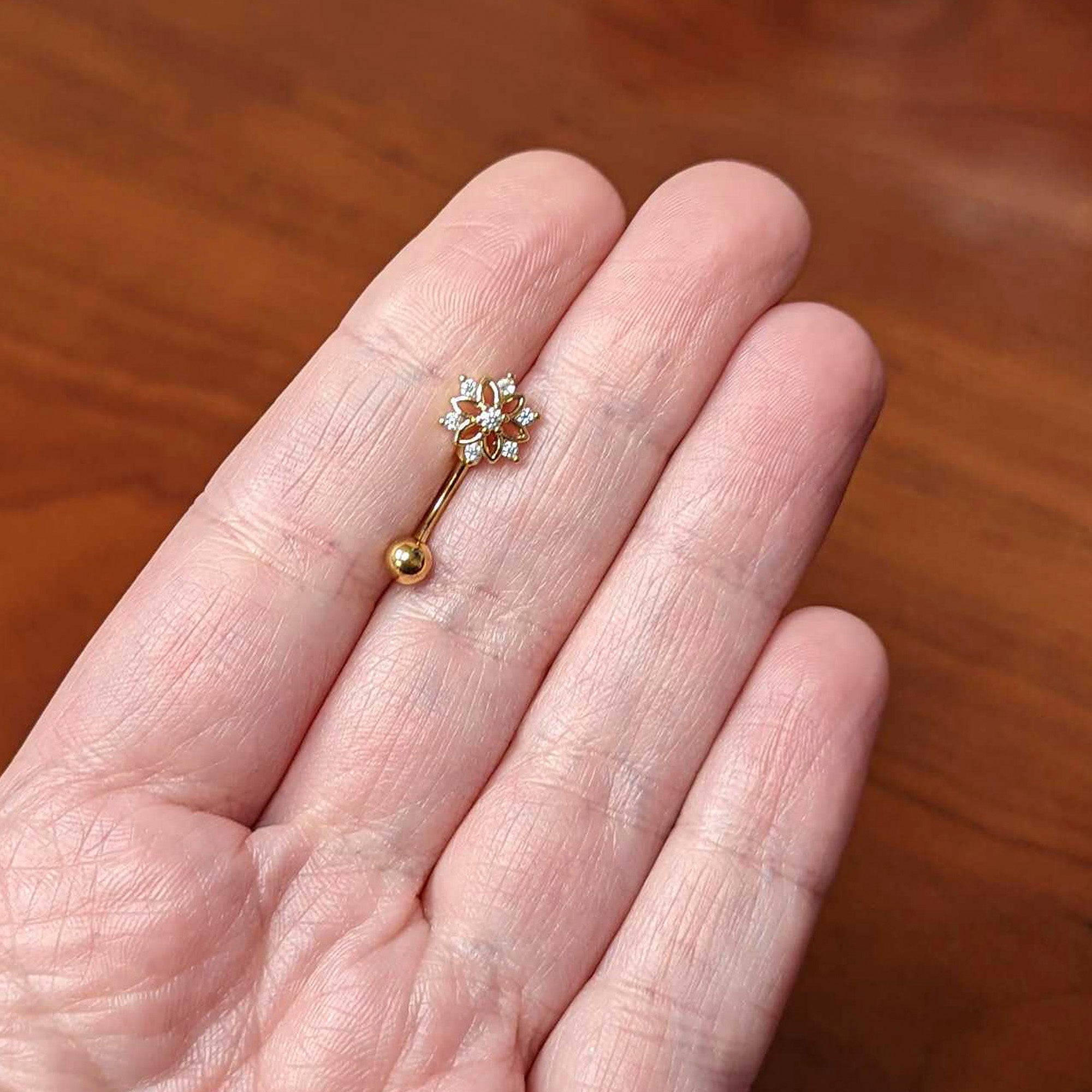 16G 5/16 Clear Gem Gold Tone Flower Snowflake Curved Eyebrow Ring