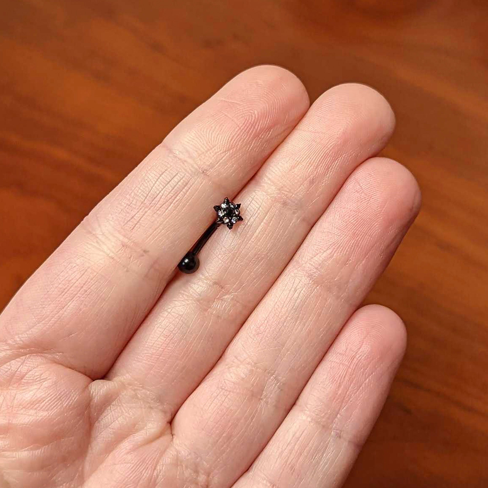 16G 5/16 Clear CZ Gem Black Abstract Sun Curved Eyebrow Ring