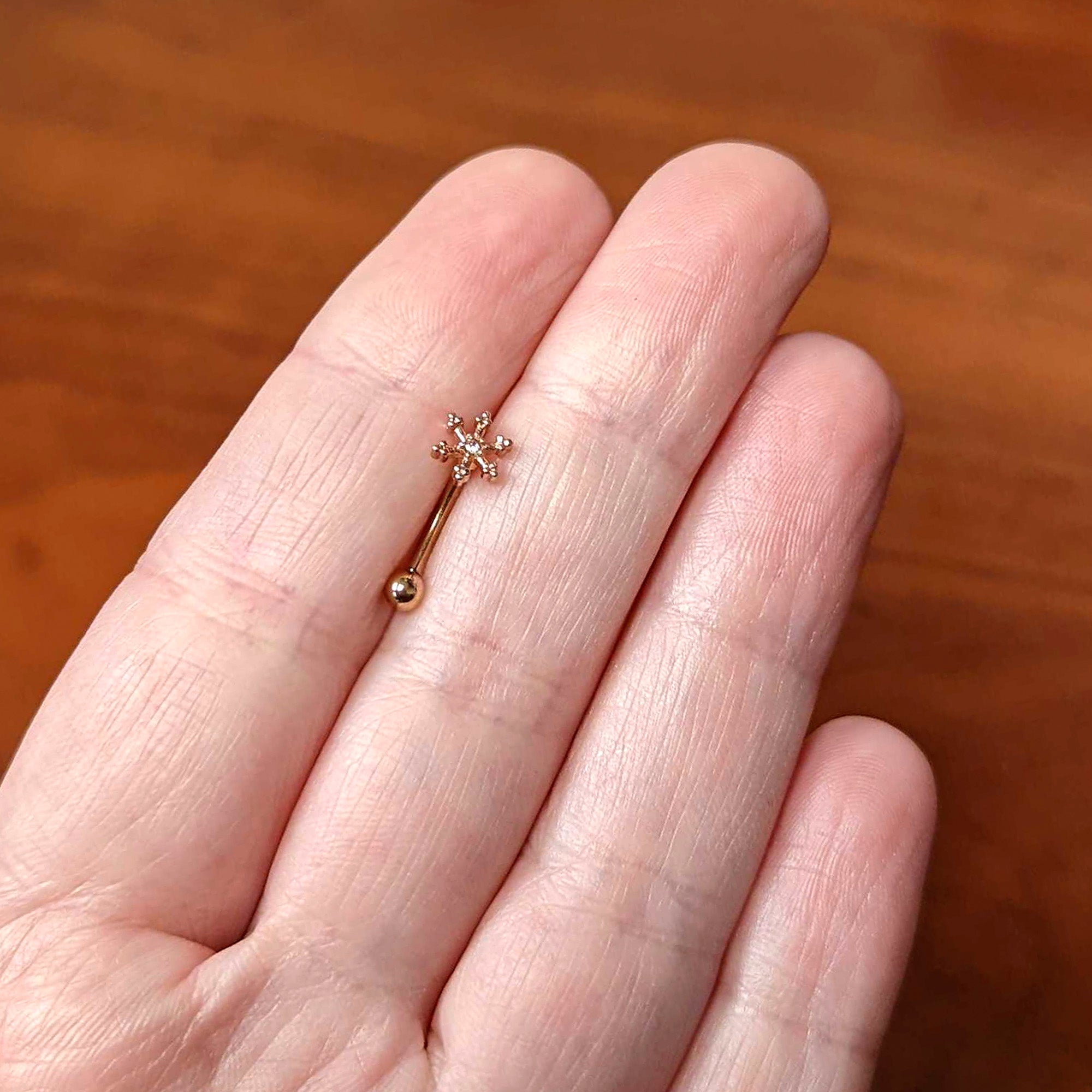 16G 5/16 Clear Gem Rose Gold Tone Snowflake Curved Eyebrow Ring