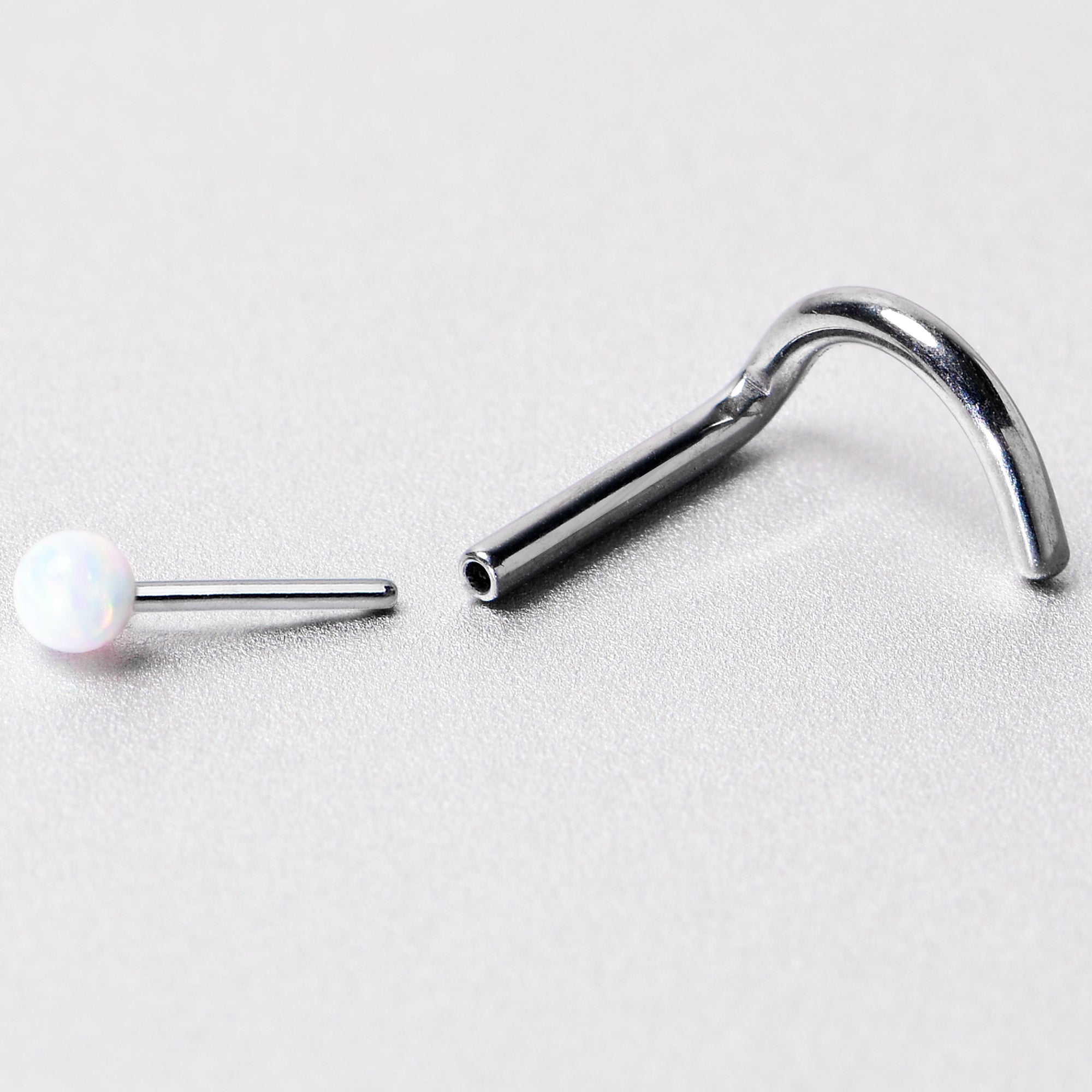 18G 1/4 White Synth Opal G23 Titanium Threadless Left Nose Screw