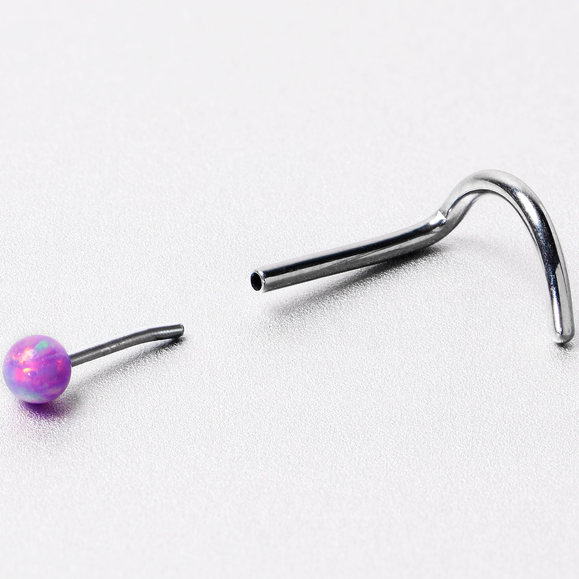 20G 1/4 Purple Synth Opal G23 Titanium Threadless Left Nose Screw