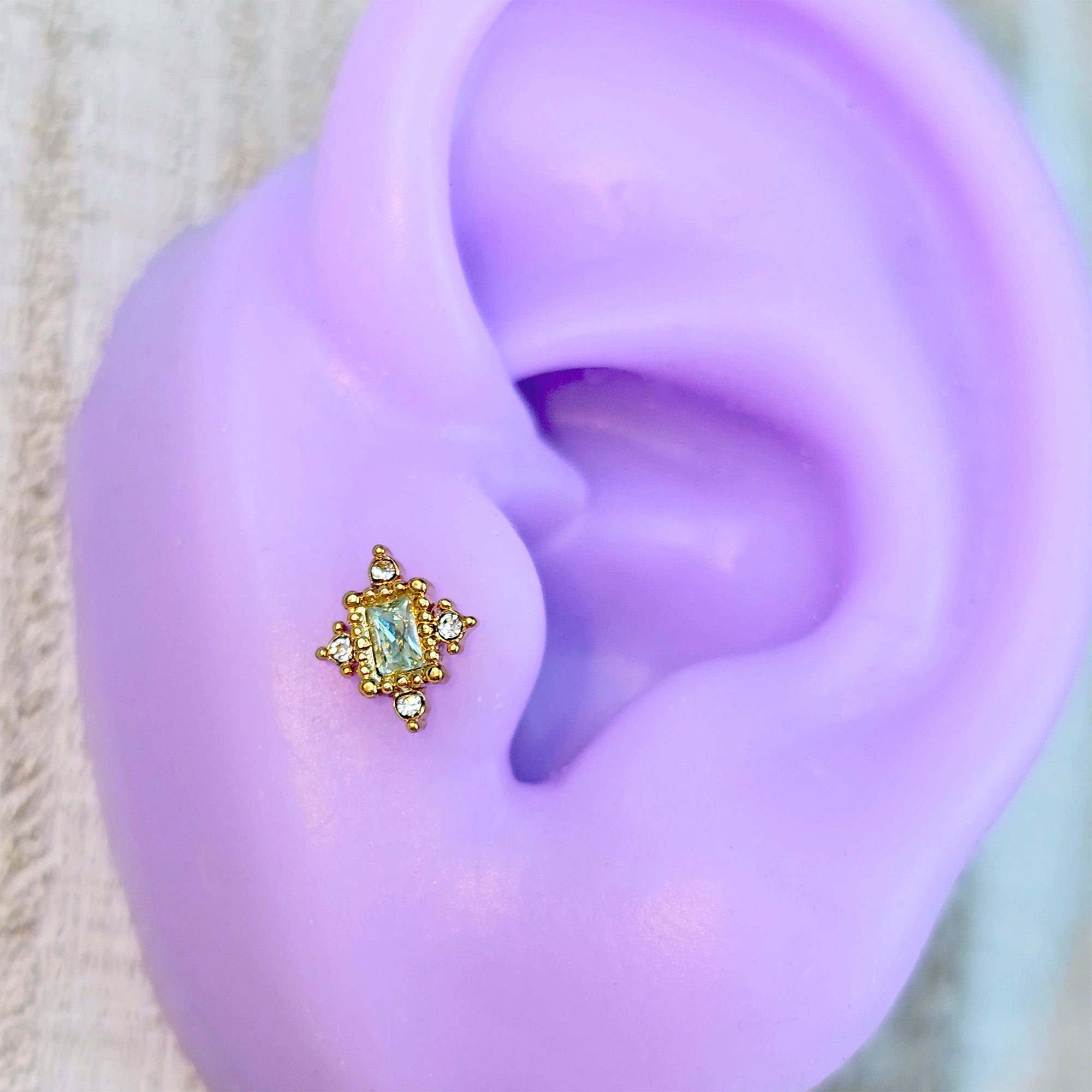 16G 1/4 Clear Blue Gem Gold Tone Regal Seal Cartilage Tragus Earring