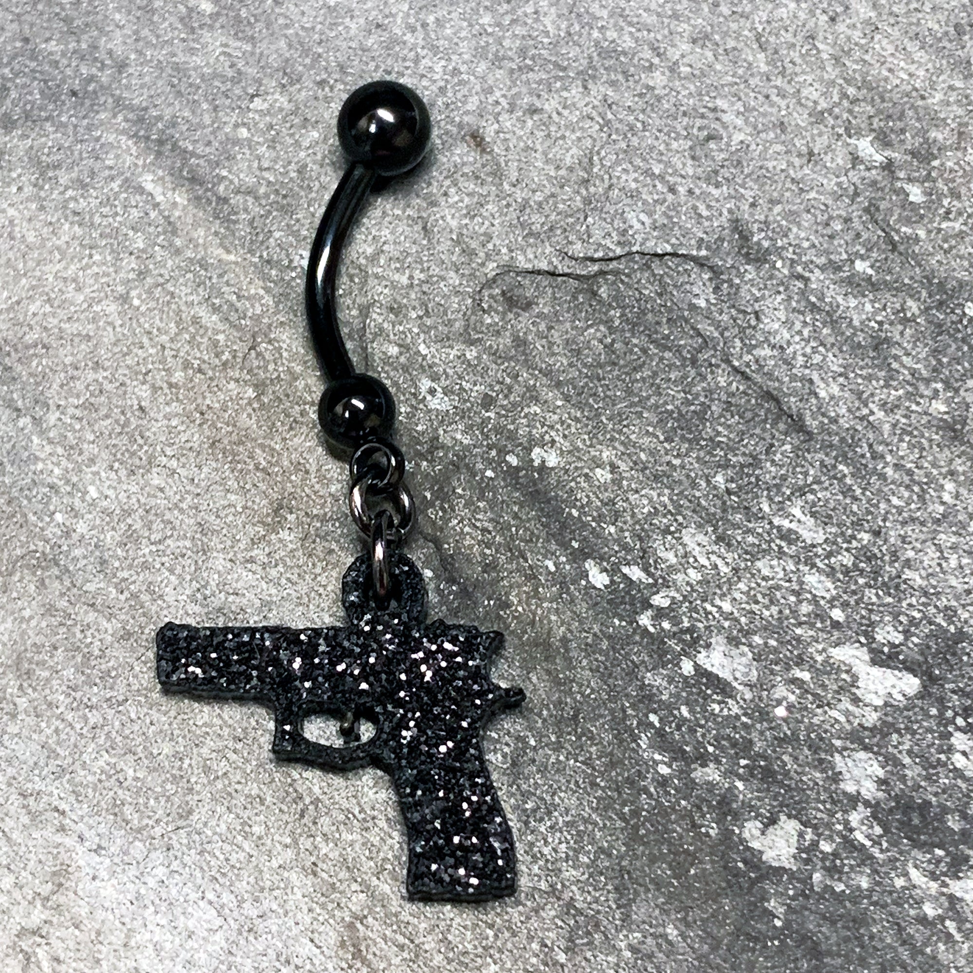 Jet Black Glitter Gun Dangle Stainless Steel Belly Ring perfect for sensitive skin