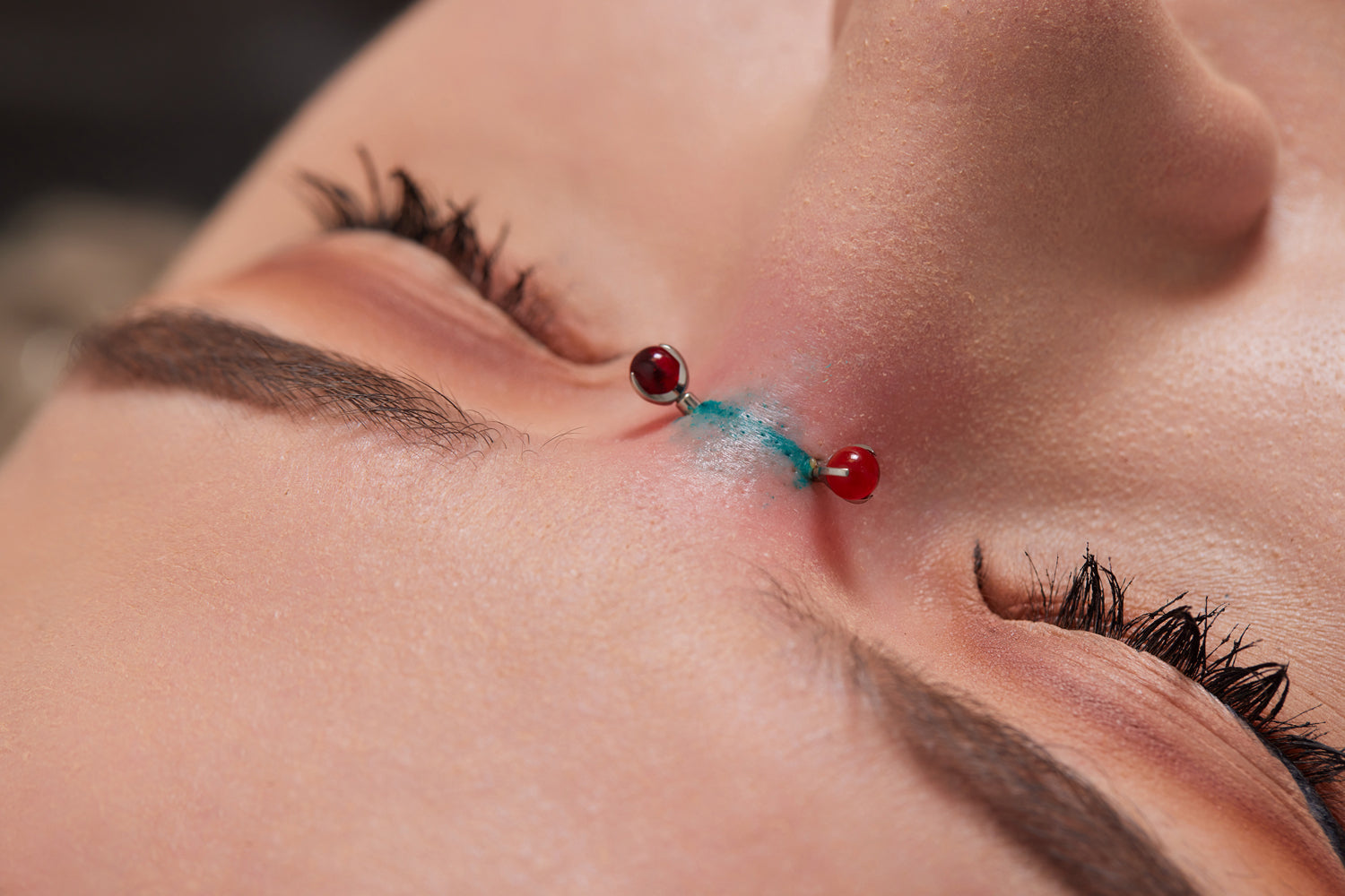 Everything You Need to Know About Bridge Piercings