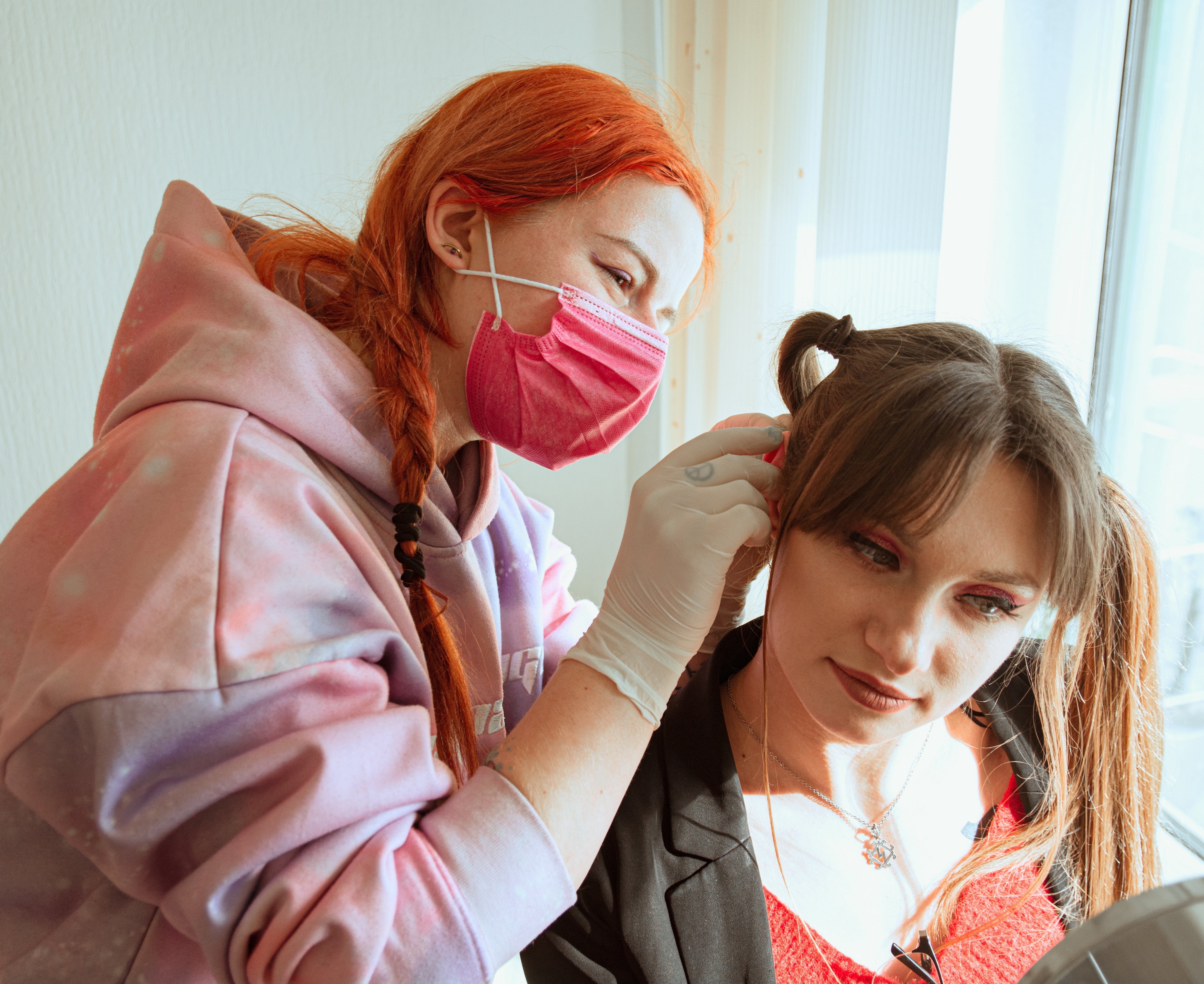 How do professional piercers avoid rejection and infection?