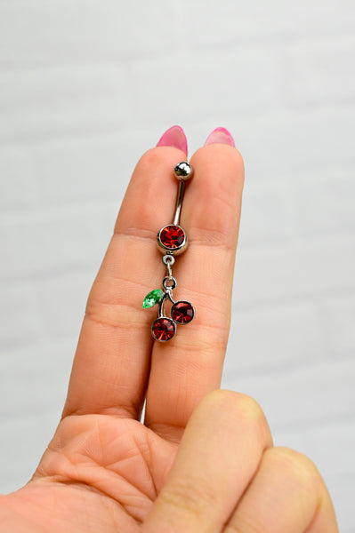 Belly button ring with red cherries