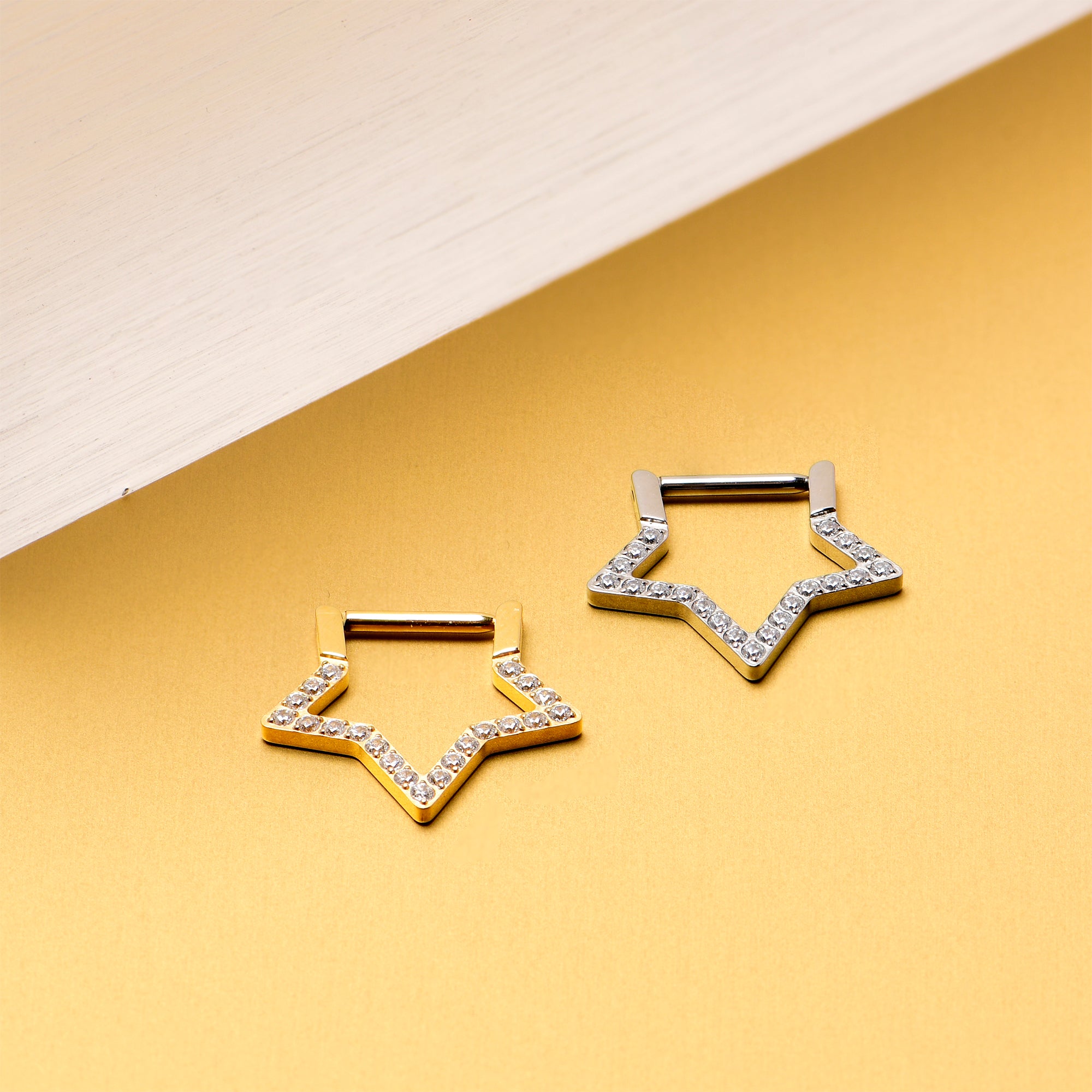 Titanium star shaped hinged hoop for ear piercing