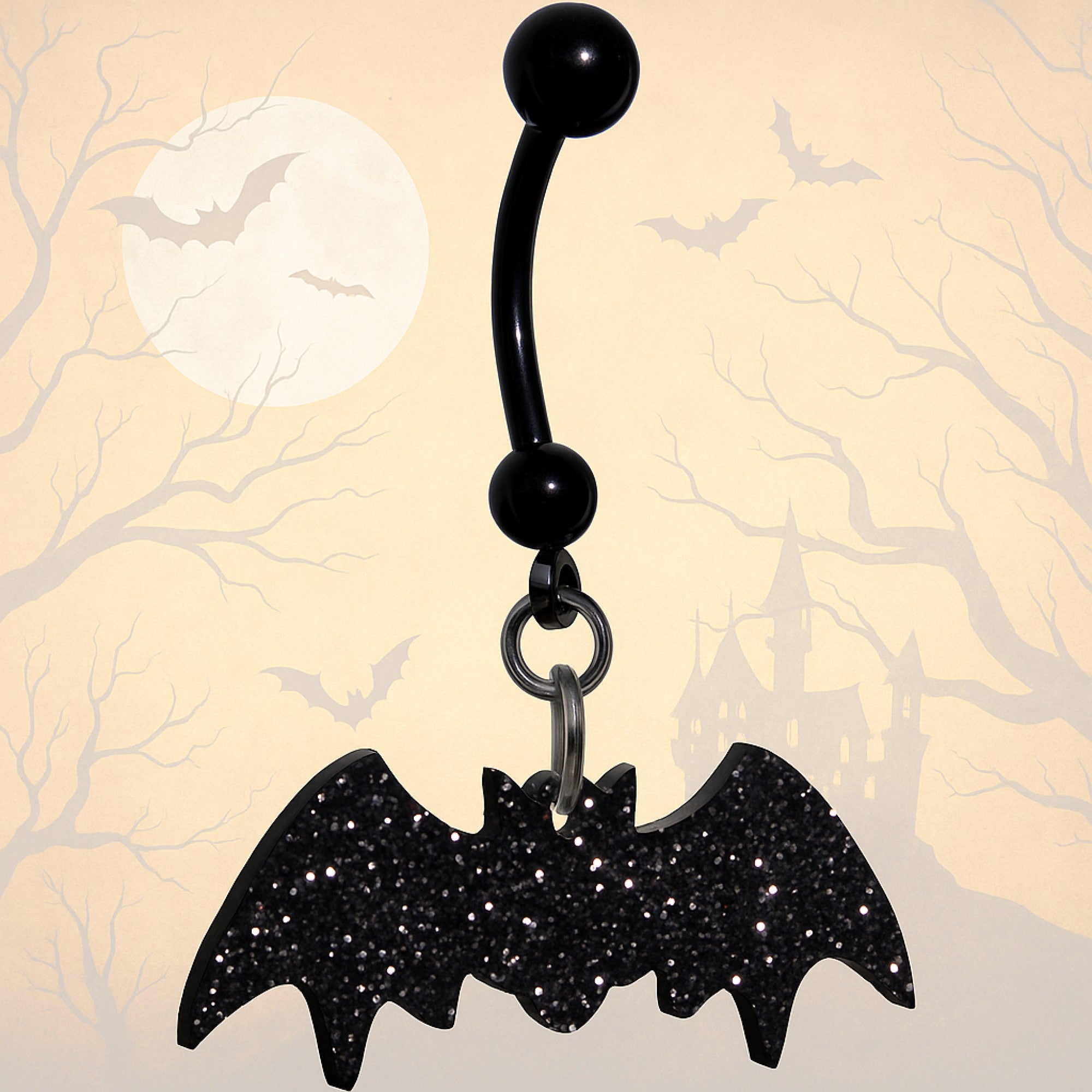 Black glitter bat-shaped belly button ring on a Halloween-themed background with bats and moon.