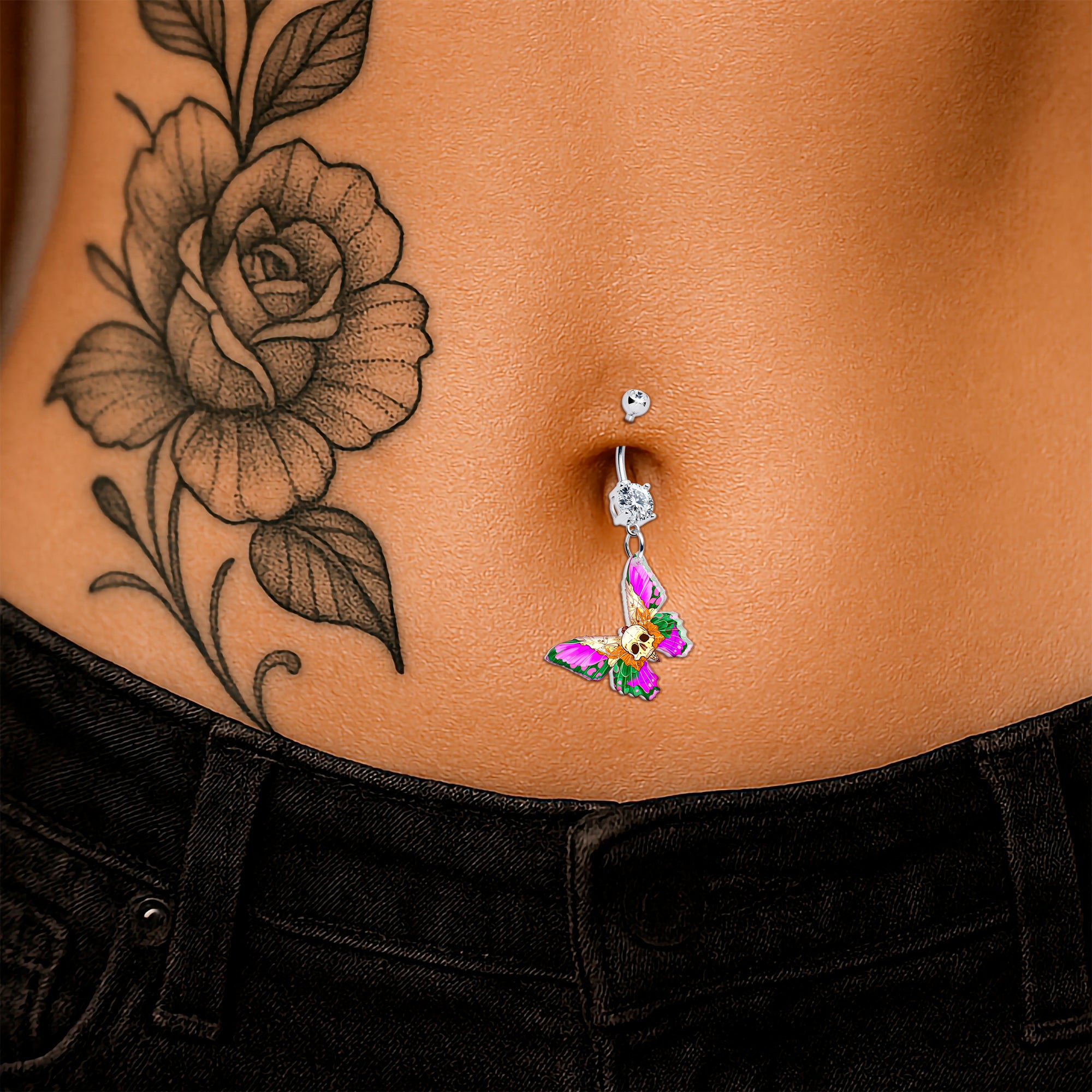 Dangle belly ring featuring clear gem butterfly skull