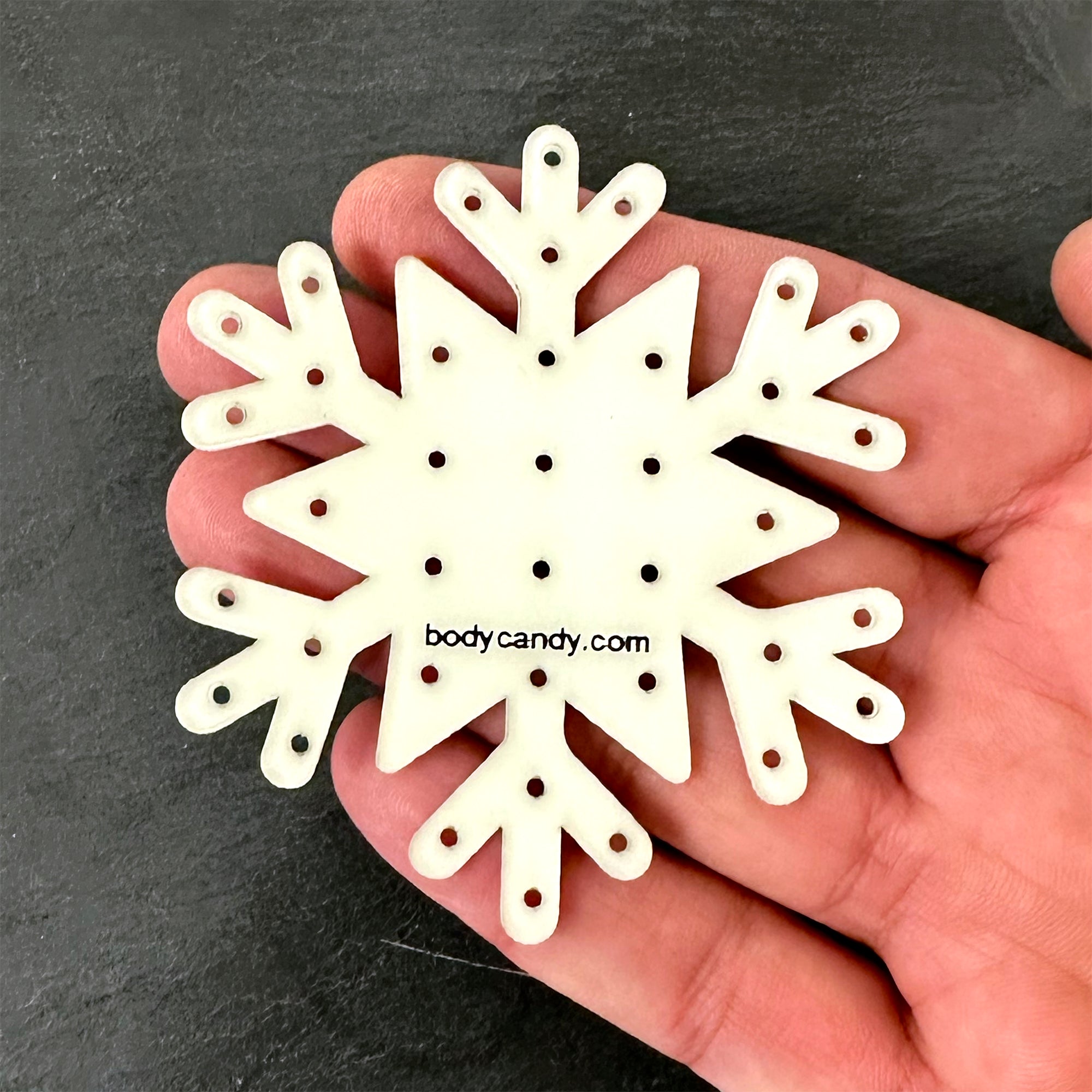 Compact snowflake earring palette that glows in the dark