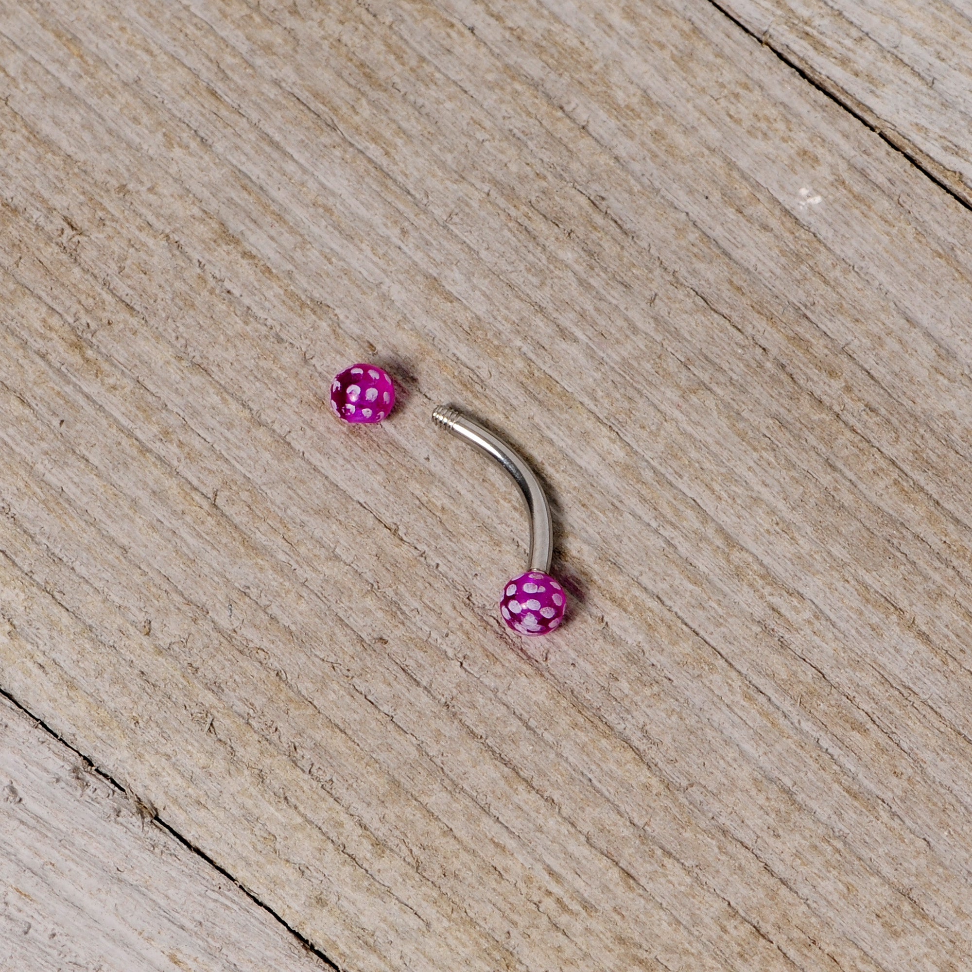16 Gauge 5/16 Purple Polka Dot UV Reactive Acrylic Ball Curved Barbell