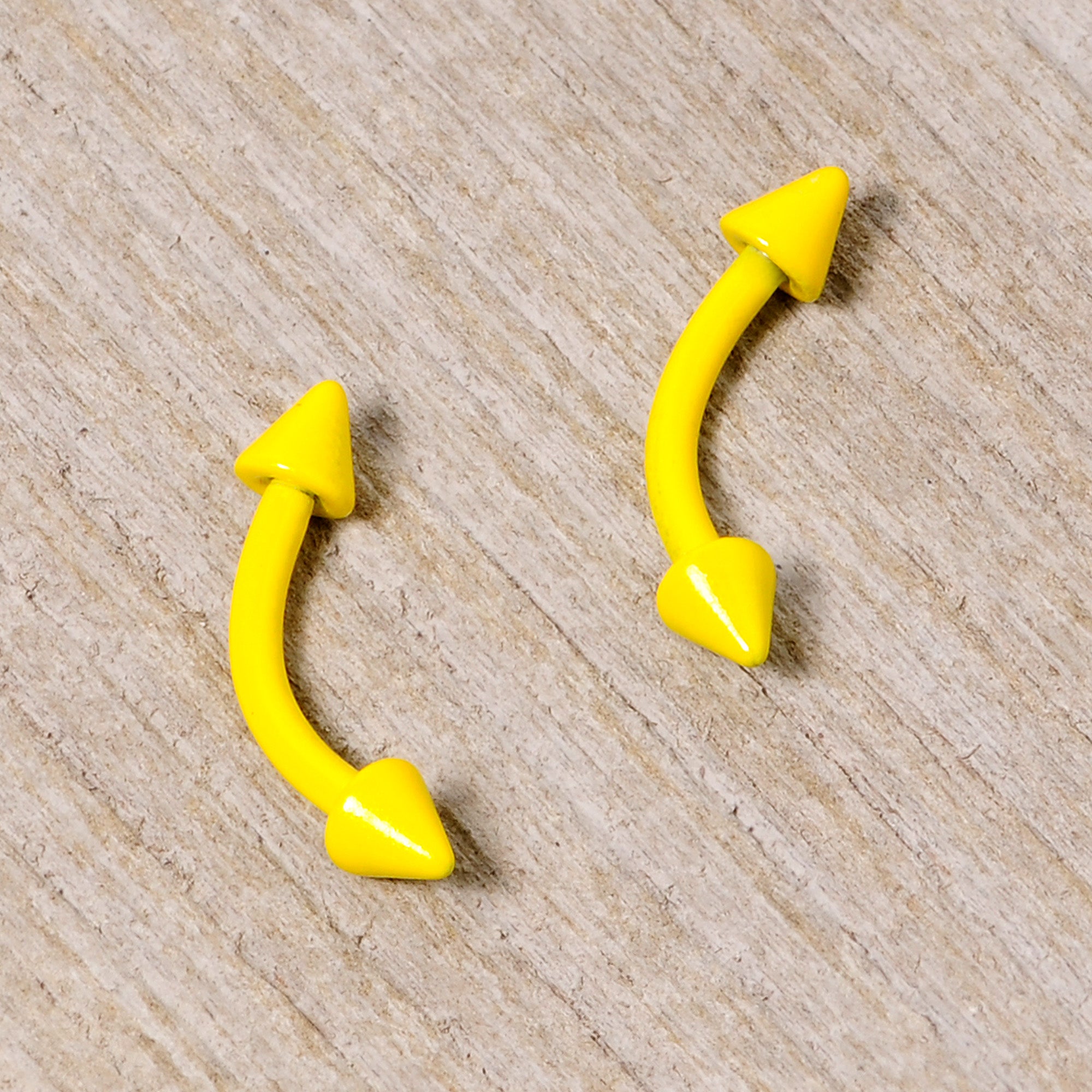 16 Gauge 5/16 Yellow Glow in the Dark Cone End Curved Barbell Set of 2