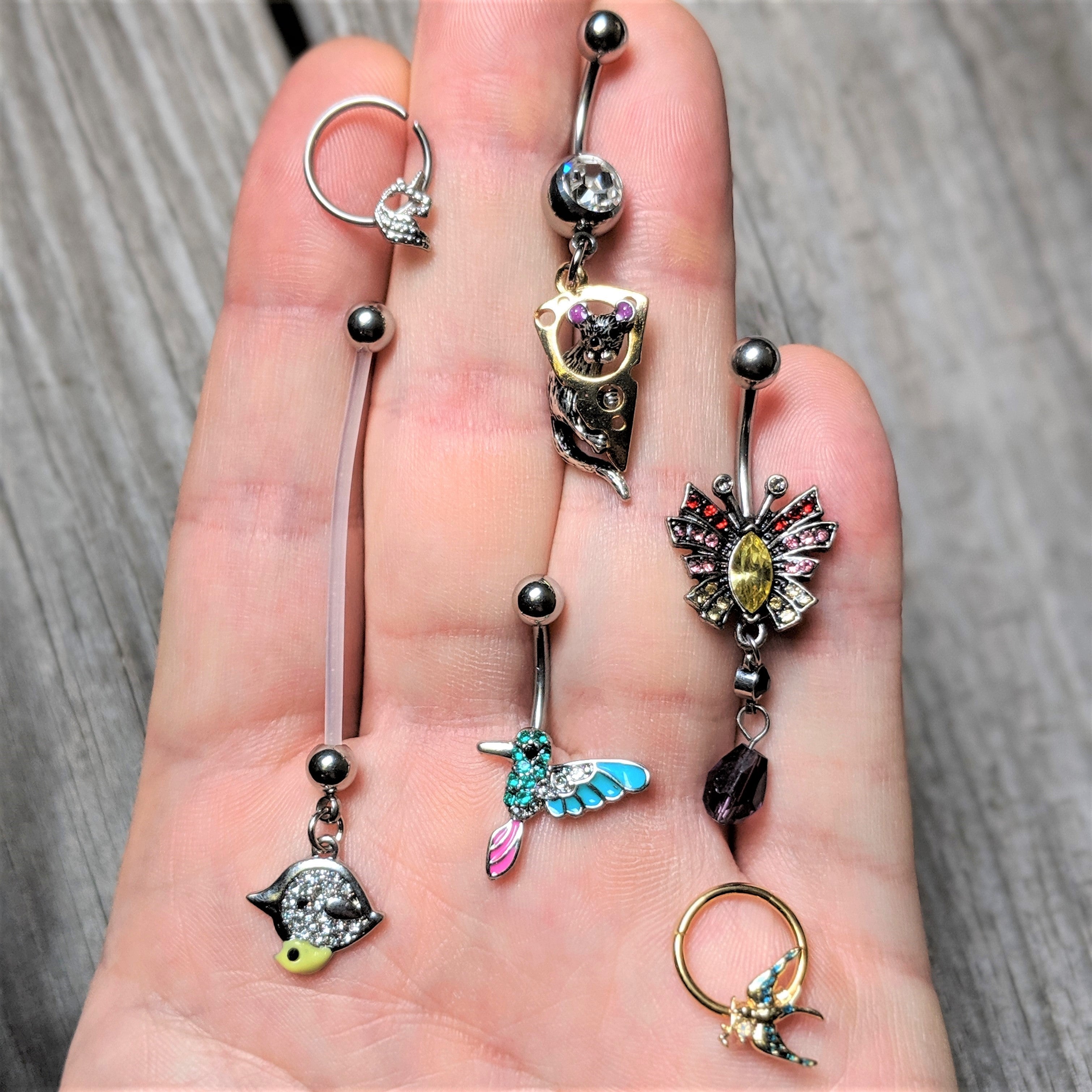 16G 3/8 White Faux Opal Gold Hue Swallow Bird Hinged Segment Ring