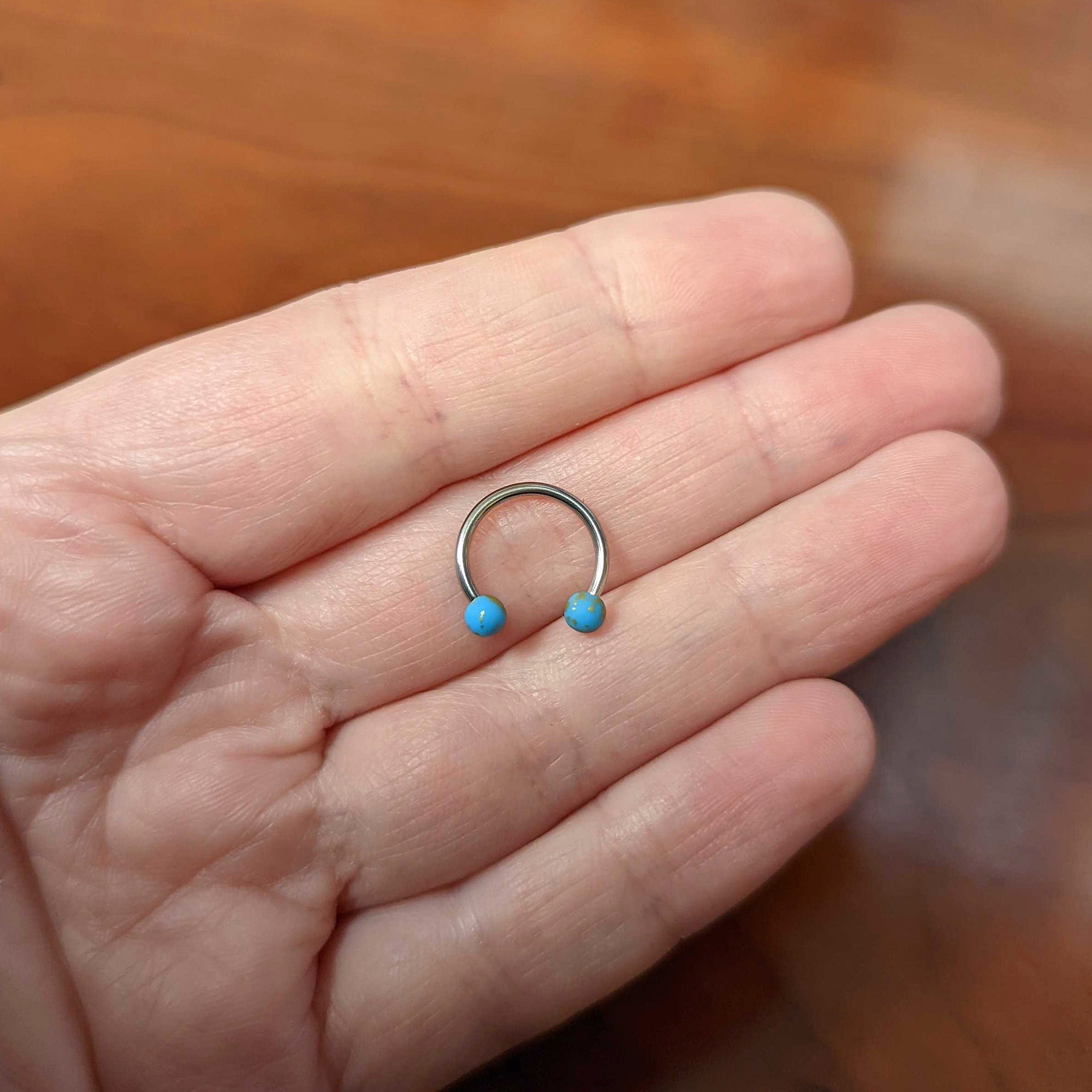 16G 3/8 Matte Blue Splatter Ends Horseshoe Circular Barbell