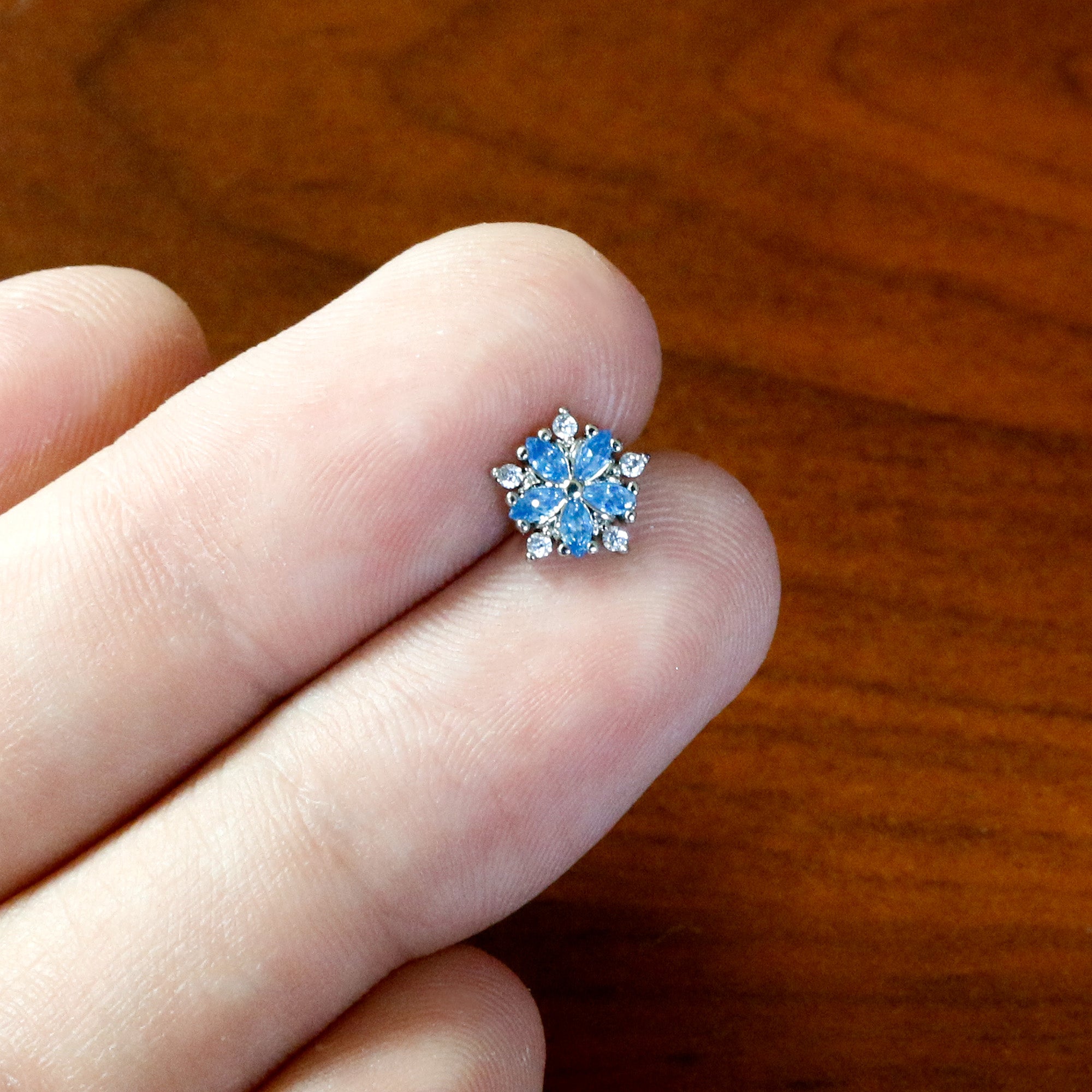 16G 1/4 Blue CZ Gem Floral Burst Cartilage Tragus Earring