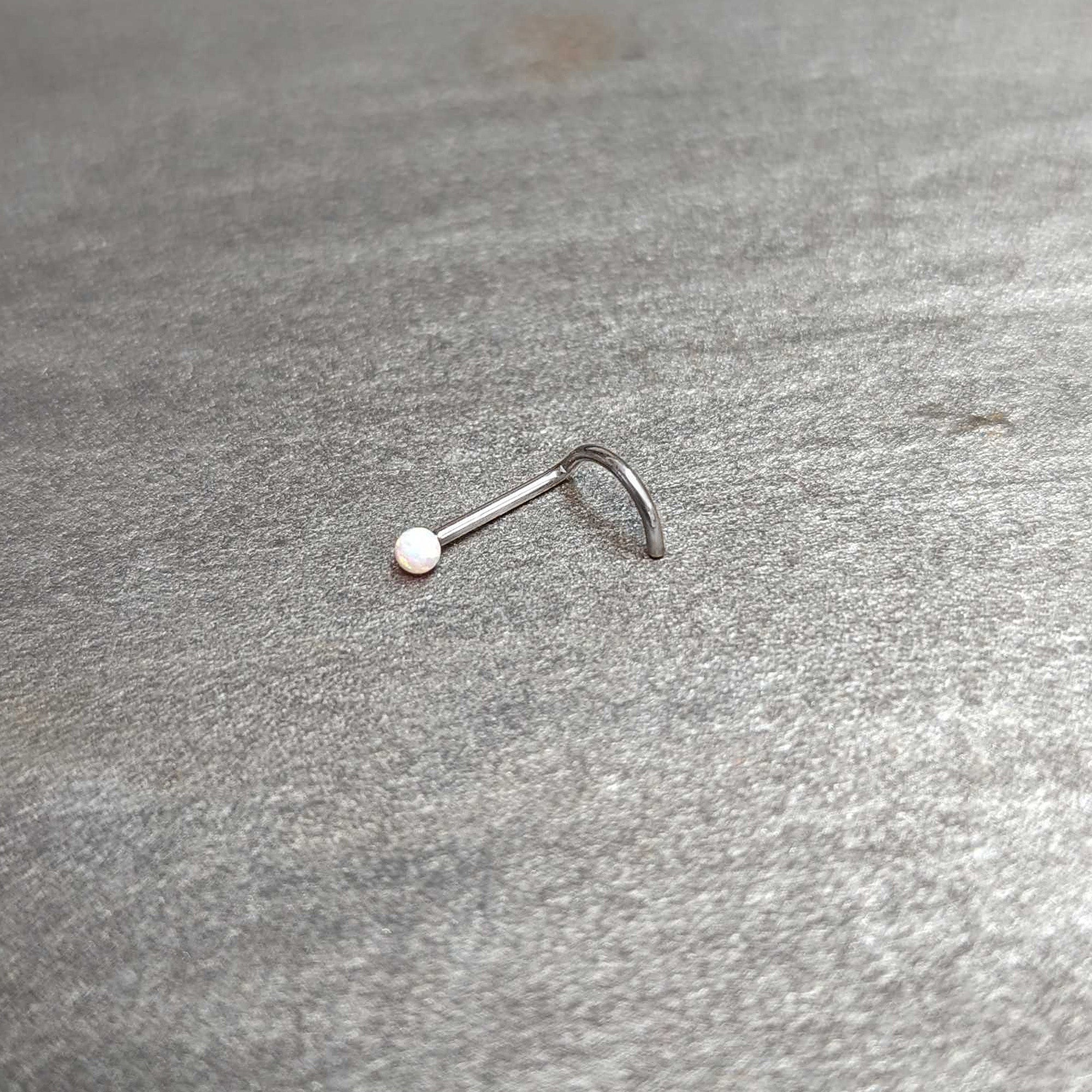 20G 1/4 White Synth Opal G23 Titanium Threadless Left Nose Screw
